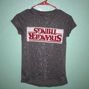 Stranger things shirt.